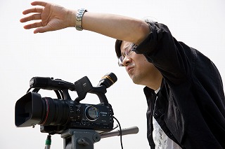 カメラマンの顔写真